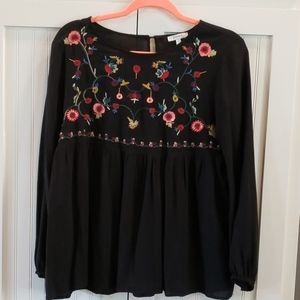 Embroidered yoke front empire waisted blouse
